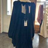 Pleated black mini dress